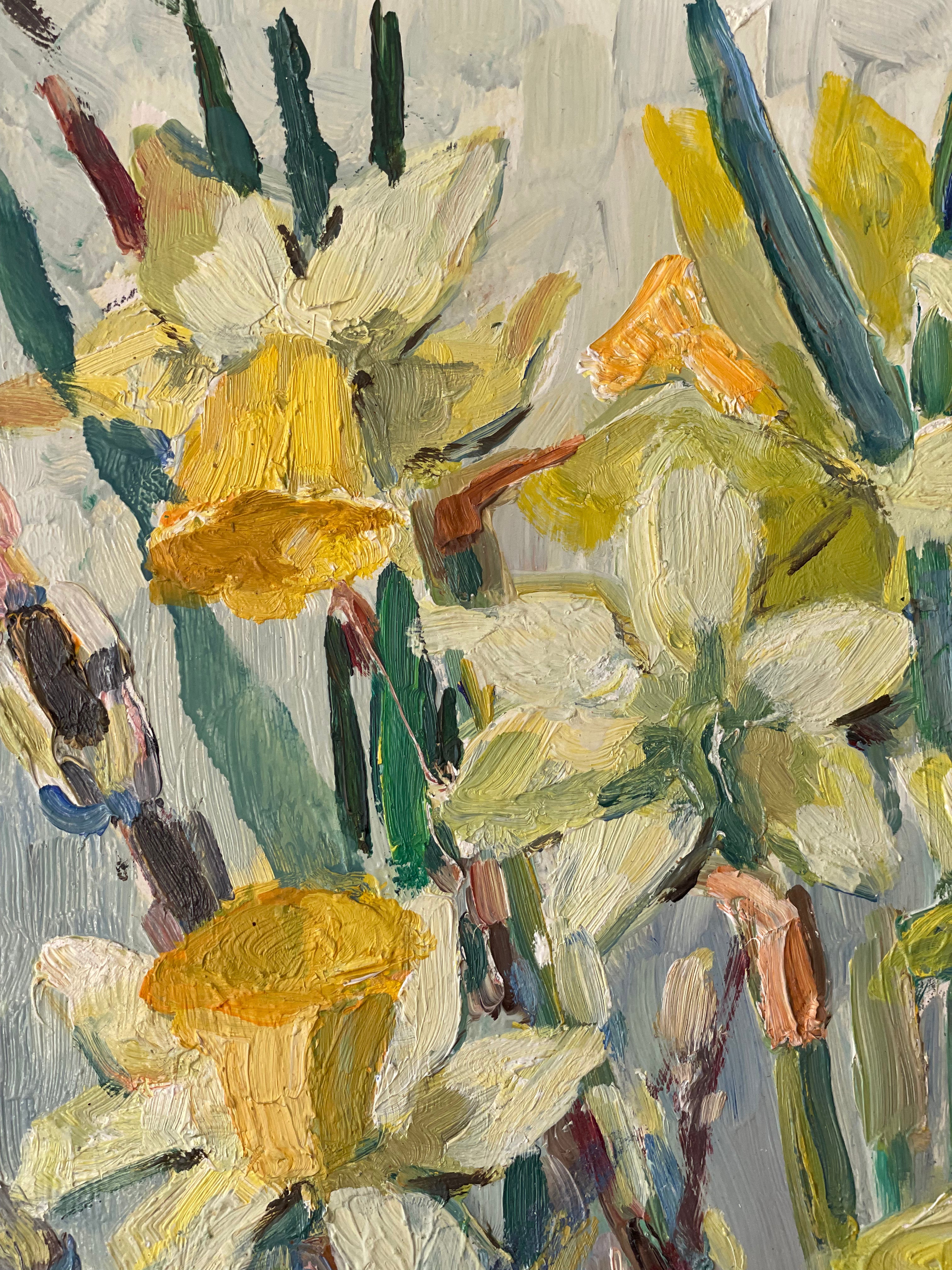 Daffodils and Tulips in a Blue Glass Vase